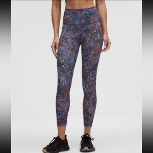 Lululemon Wunder Train HR Tight 25” size 14 cosmic leopard